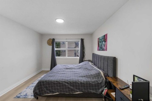 27 Cedarwood Lane Sw, Calgary, AB - Indoor Photo Showing Bedroom