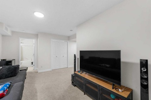 27 Cedarwood Lane Sw, Calgary, AB - Indoor Photo Showing Living Room