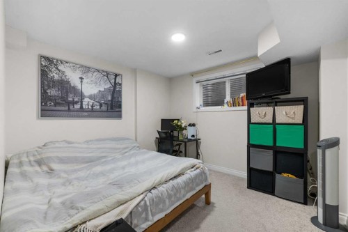 27 Cedarwood Lane Sw, Calgary, AB - Indoor Photo Showing Bedroom