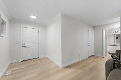 27 Cedarwood Lane Sw, Calgary, AB - Indoor Photo Showing Other Room