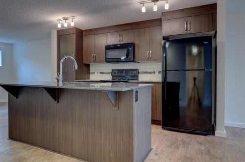 101 Auburn Bay Street Se, Calgary, AB - Indoor Photo Showing Kitchen