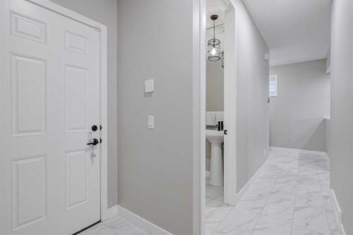 73 Magnolia Terrace Se, Calgary, AB - Indoor Photo Showing Other Room