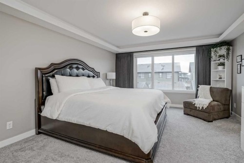 73 Magnolia Terrace Se, Calgary, AB - Indoor Photo Showing Bedroom