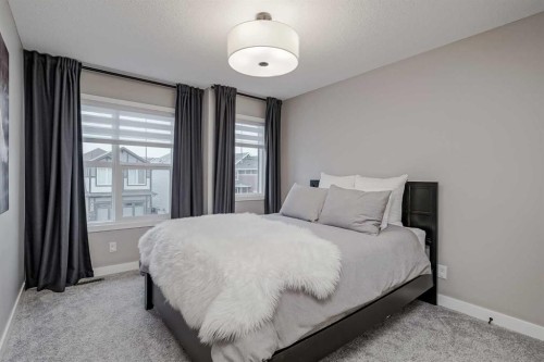 73 Magnolia Terrace Se, Calgary, AB - Indoor Photo Showing Bedroom