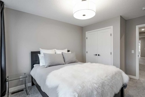 73 Magnolia Terrace Se, Calgary, AB - Indoor Photo Showing Bedroom