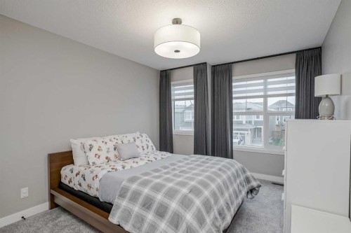 73 Magnolia Terrace Se, Calgary, AB - Indoor Photo Showing Bedroom