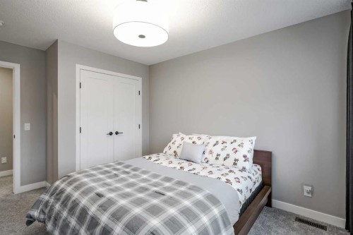 73 Magnolia Terrace Se, Calgary, AB - Indoor Photo Showing Bedroom