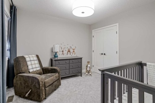 73 Magnolia Terrace Se, Calgary, AB - Indoor Photo Showing Bedroom