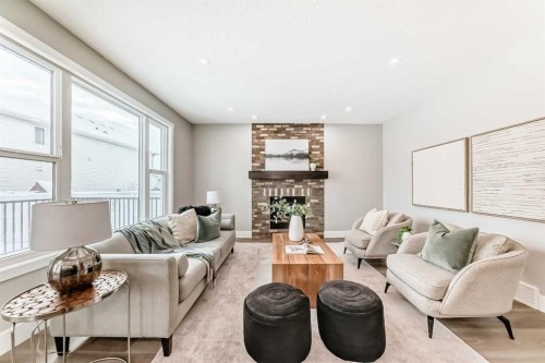 101 Auburn Springs Park Se, Calgary, AB - Indoor Photo Showing Living Room With Fireplace