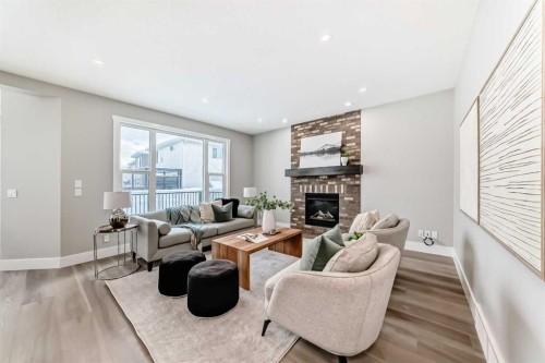 101 Auburn Springs Park Se, Calgary, AB - Indoor Photo Showing Living Room With Fireplace