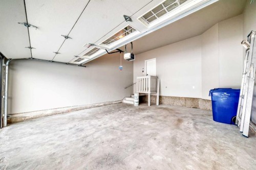 101 Auburn Springs Park Se, Calgary, AB - Indoor Photo Showing Garage