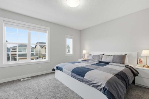 48 Seton Villas Se, Calgary, AB - Indoor Photo Showing Bedroom