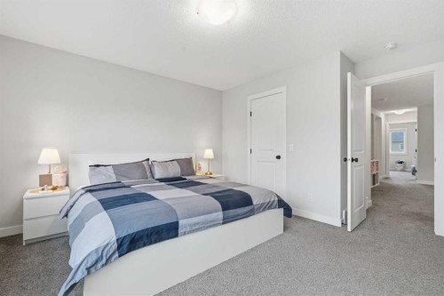 48 Seton Villas Se, Calgary, AB - Indoor Photo Showing Bedroom