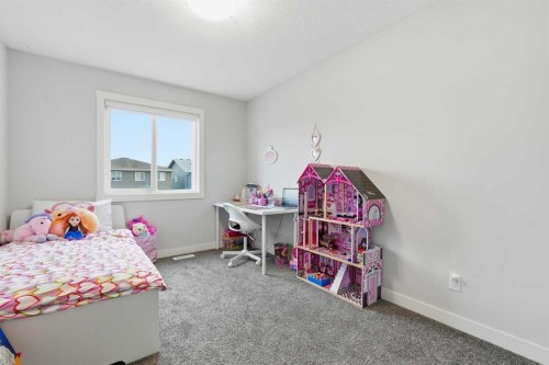 48 Seton Villas Se, Calgary, AB - Indoor Photo Showing Bedroom