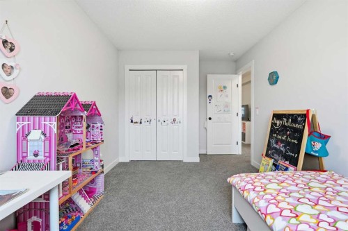 48 Seton Villas Se, Calgary, AB - Indoor Photo Showing Bedroom