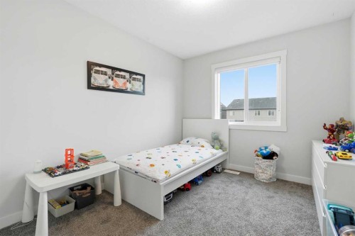 48 Seton Villas Se, Calgary, AB - Indoor Photo Showing Bedroom