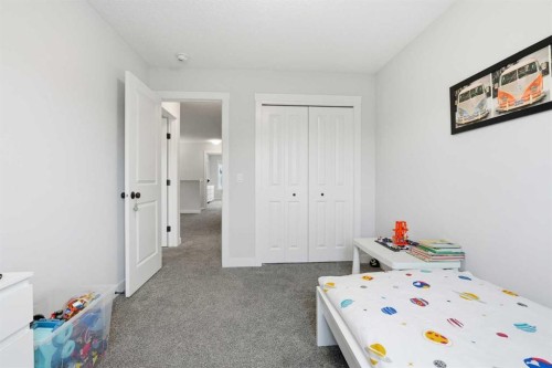 48 Seton Villas Se, Calgary, AB - Indoor Photo Showing Bedroom