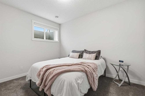 48 Seton Villas Se, Calgary, AB - Indoor Photo Showing Bedroom