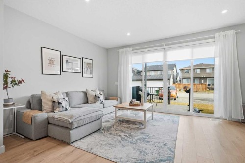 48 Seton Villas Se, Calgary, AB - Indoor Photo Showing Living Room