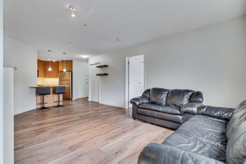 113-35 Richard Court Sw, Calgary, AB - Indoor Photo Showing Living Room
