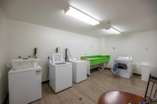 410-3730 50 Street Nw, Calgary, AB - Indoor Photo Showing Laundry Room