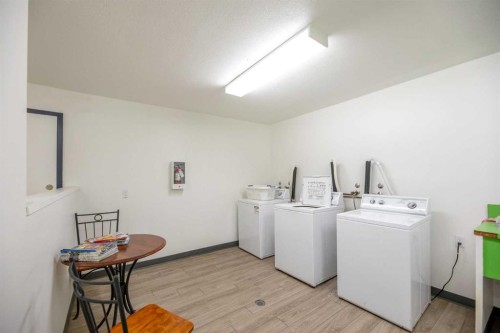 410-3730 50 Street Nw, Calgary, AB - Indoor Photo Showing Laundry Room