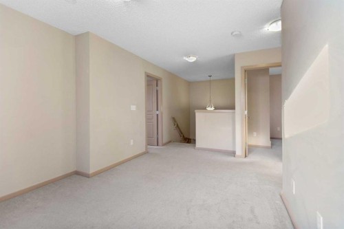 1083 Prairie Springs Hill Sw, Airdrie, AB - Indoor Photo Showing Other Room