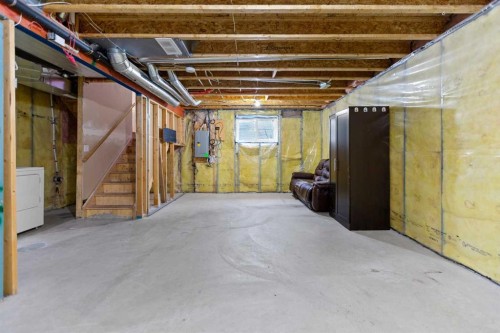 1083 Prairie Springs Hill Sw, Airdrie, AB - Indoor Photo Showing Basement