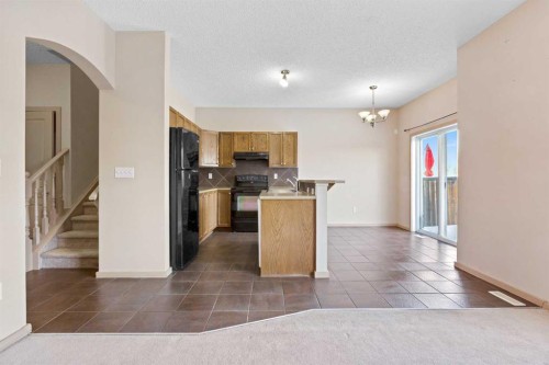 1083 Prairie Springs Hill Sw, Airdrie, AB - Indoor Photo Showing Kitchen