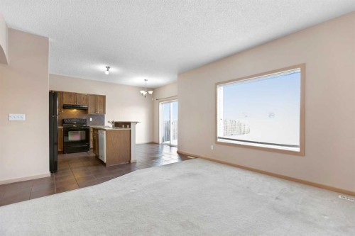 1083 Prairie Springs Hill Sw, Airdrie, AB - Indoor Photo Showing Kitchen