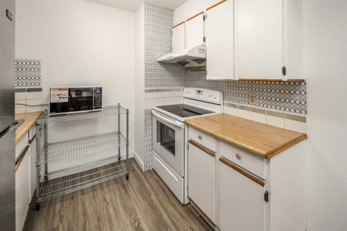 33-4936 Dalton Drive Nw, Calgary, AB - Indoor Photo Showing Kitchen