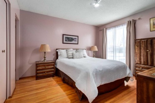 180 Maple Court Crescent Se, Calgary, AB - Indoor Photo Showing Bedroom