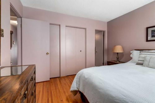 180 Maple Court Crescent Se, Calgary, AB - Indoor Photo Showing Bedroom