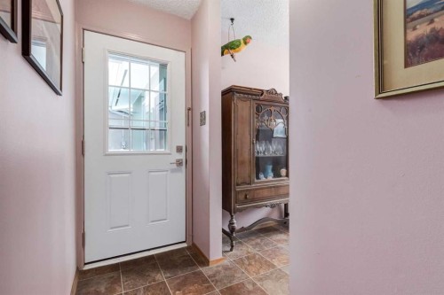 180 Maple Court Crescent Se, Calgary, AB - Indoor Photo Showing Other Room