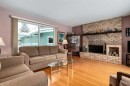 180 Maple Court Crescent Se, Calgary, AB  - Indoor Photo Showing Living Room With Fireplace 