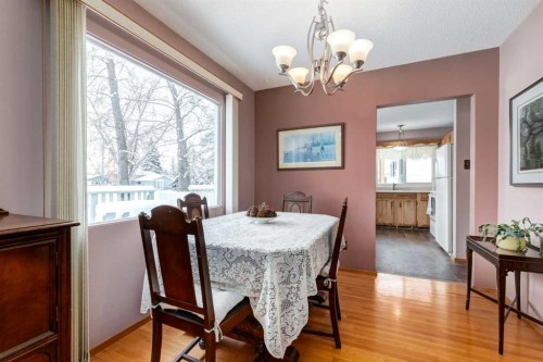 180 Maple Court Crescent Se, Calgary, AB - Indoor Photo Showing Dining Room