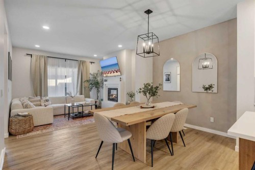 78 Mallard Heath Se, Calgary, AB - Indoor With Fireplace