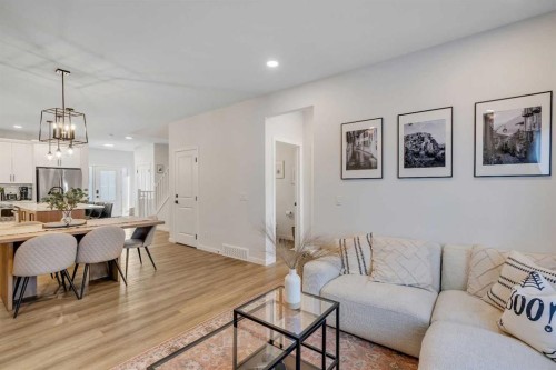 78 Mallard Heath Se, Calgary, AB - Indoor Photo Showing Living Room