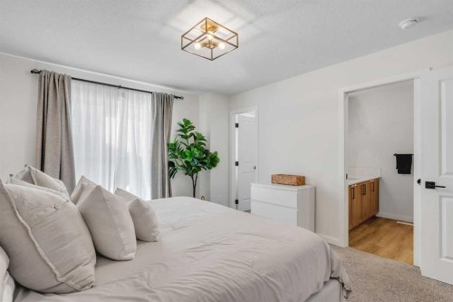 78 Mallard Heath Se, Calgary, AB - Indoor Photo Showing Bedroom