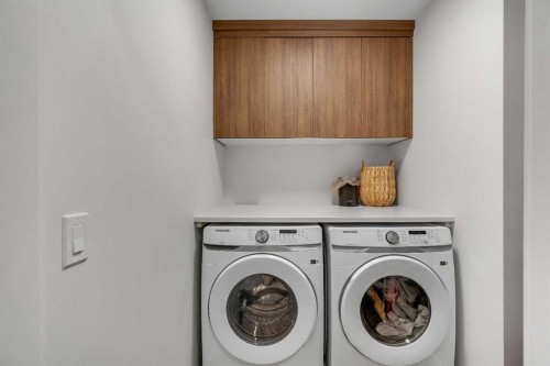 78 Mallard Heath Se, Calgary, AB - Indoor Photo Showing Laundry Room
