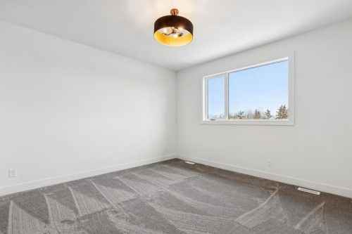 43 Elveden Park Sw, Calgary, AB - Indoor Photo Showing Other Room