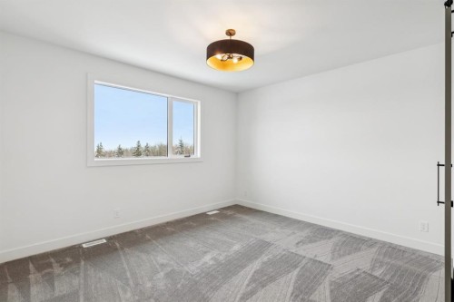 43 Elveden Park Sw, Calgary, AB - Indoor Photo Showing Other Room