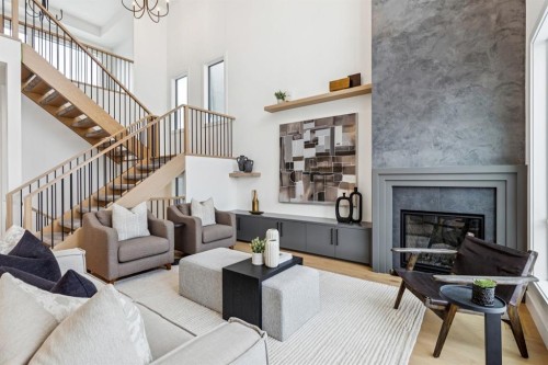 43 Elveden Park Sw, Calgary, AB - Indoor Photo Showing Living Room With Fireplace