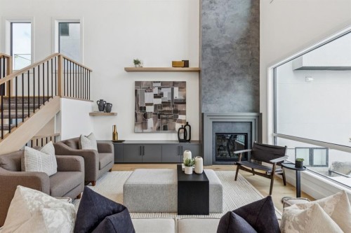 43 Elveden Park Sw, Calgary, AB - Indoor Photo Showing Living Room With Fireplace