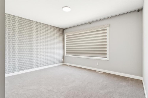 99 Precedence Hill, Cochrane, AB - Indoor Photo Showing Other Room