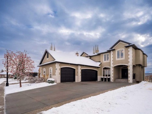 33 Discovery Rise Sw, Calgary, AB - Outdoor With Facade