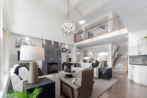 33 Discovery Rise Sw, Calgary, AB - Indoor Photo Showing Living Room With Fireplace