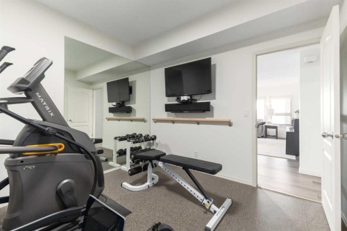 33 Discovery Rise Sw, Calgary, AB - Indoor Photo Showing Gym Room