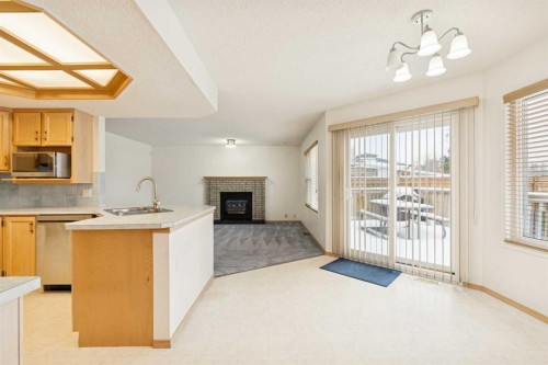 2498 Catalina Boulevard Ne, Calgary, AB - Indoor With Fireplace