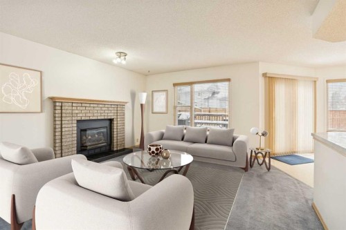 2498 Catalina Boulevard Ne, Calgary, AB - Indoor Photo Showing Living Room With Fireplace